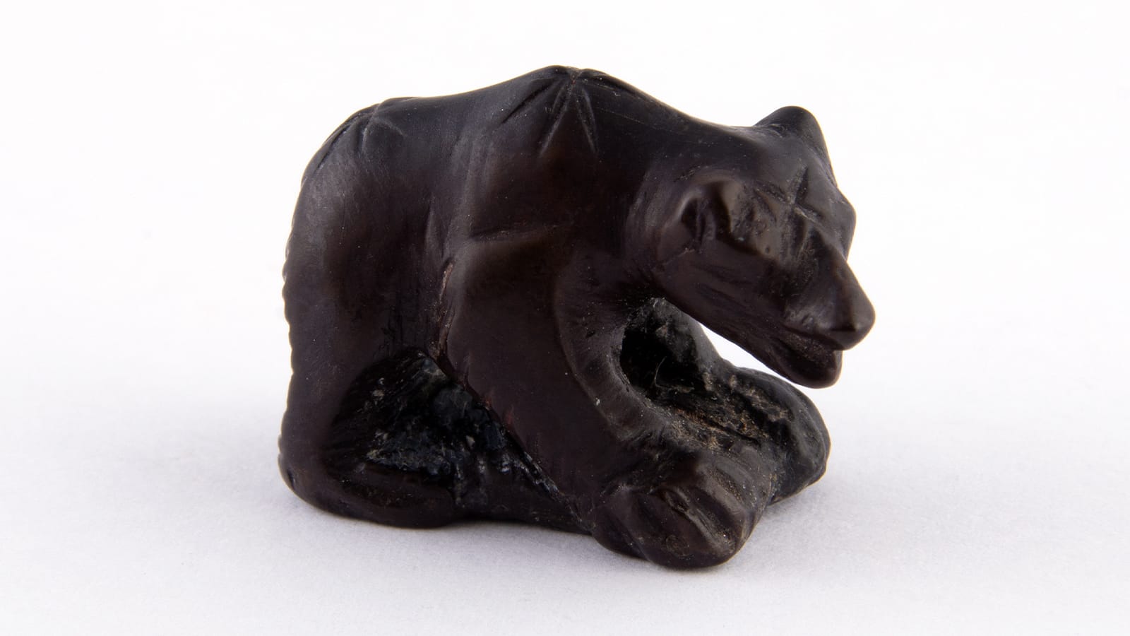 A bear statue made from jet