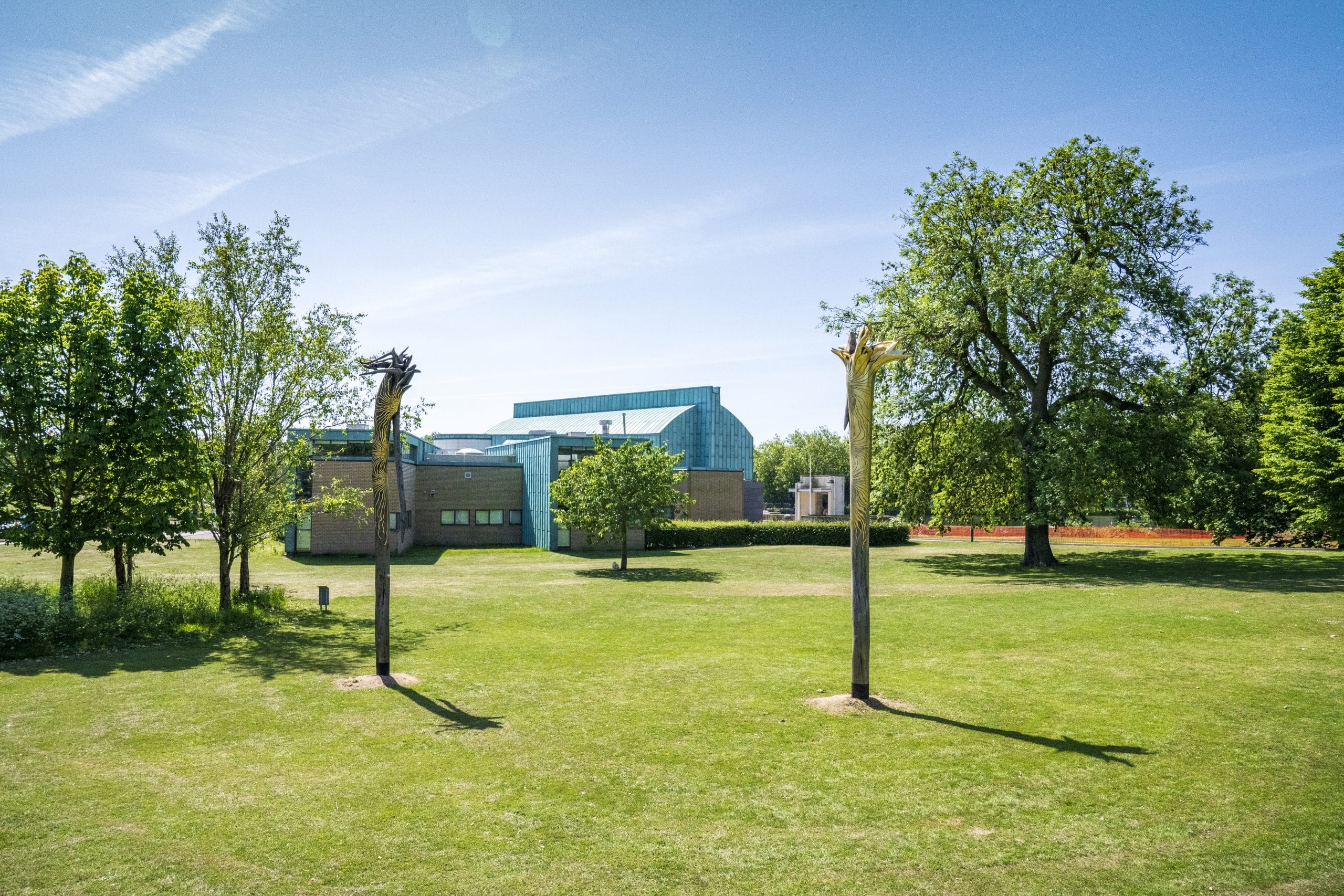 Eurydice Prevails - gold topped trees sculptures