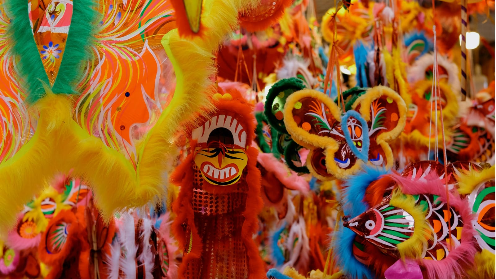 Colourful masks covered in feathers