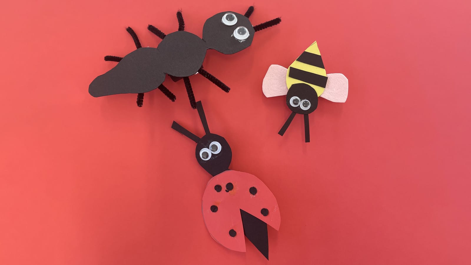 Paper finger puppets shaped like a ladybird, ant and bee
