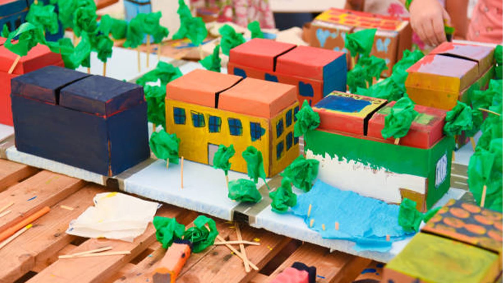 Cardboard boxes decorated to look like a city