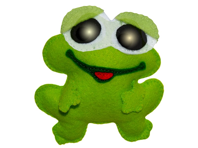 A green home made felt frog with light up eyes