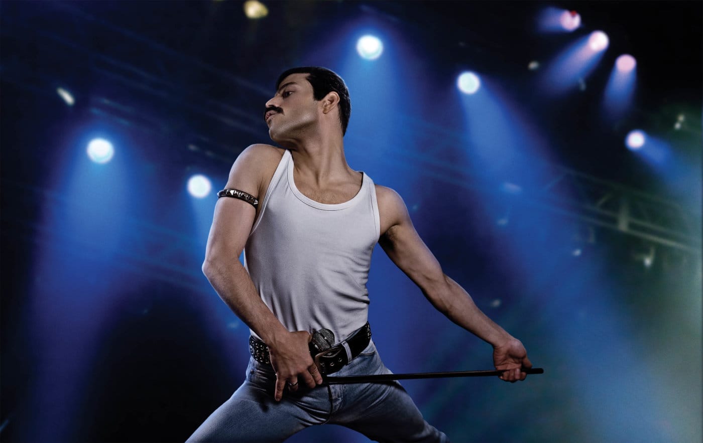 Freddie Mercury performing on stage