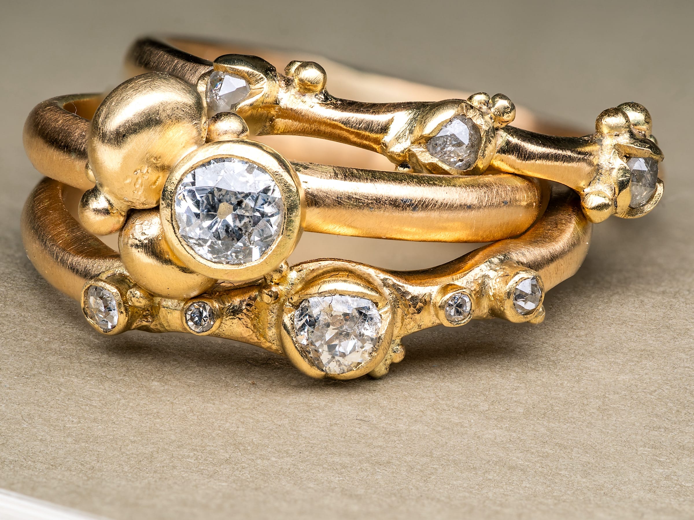 a gold and diamond decorative ring