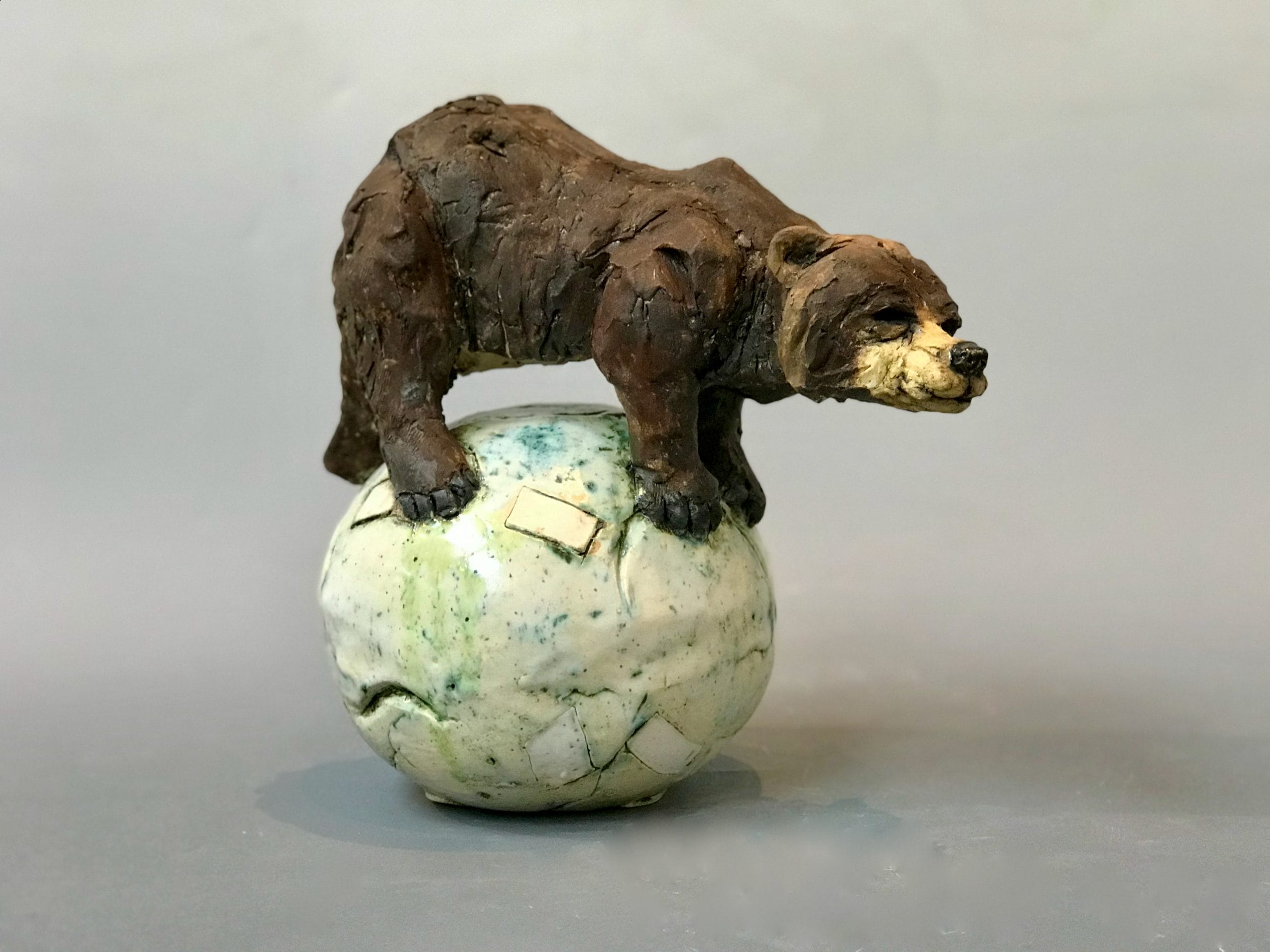 Toy bear on a ball