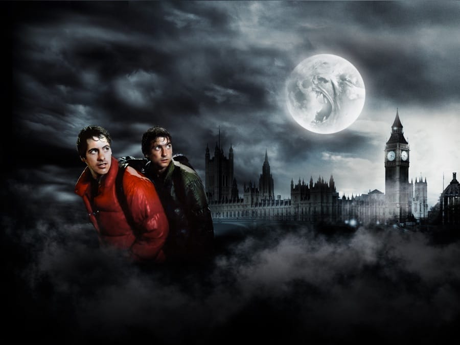 Two young men looking up at a full moon over the Palace of Westminster