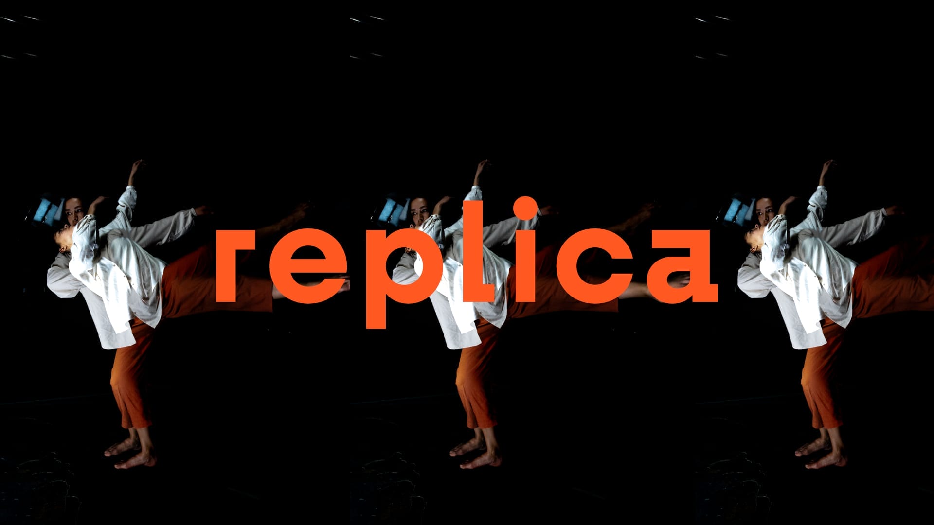 A repeated photograph of two people dancing, one stood in front of the other, both wearing orange trousers and white shirts with a black backdrop and the word 'replica' sat centrally in orange.