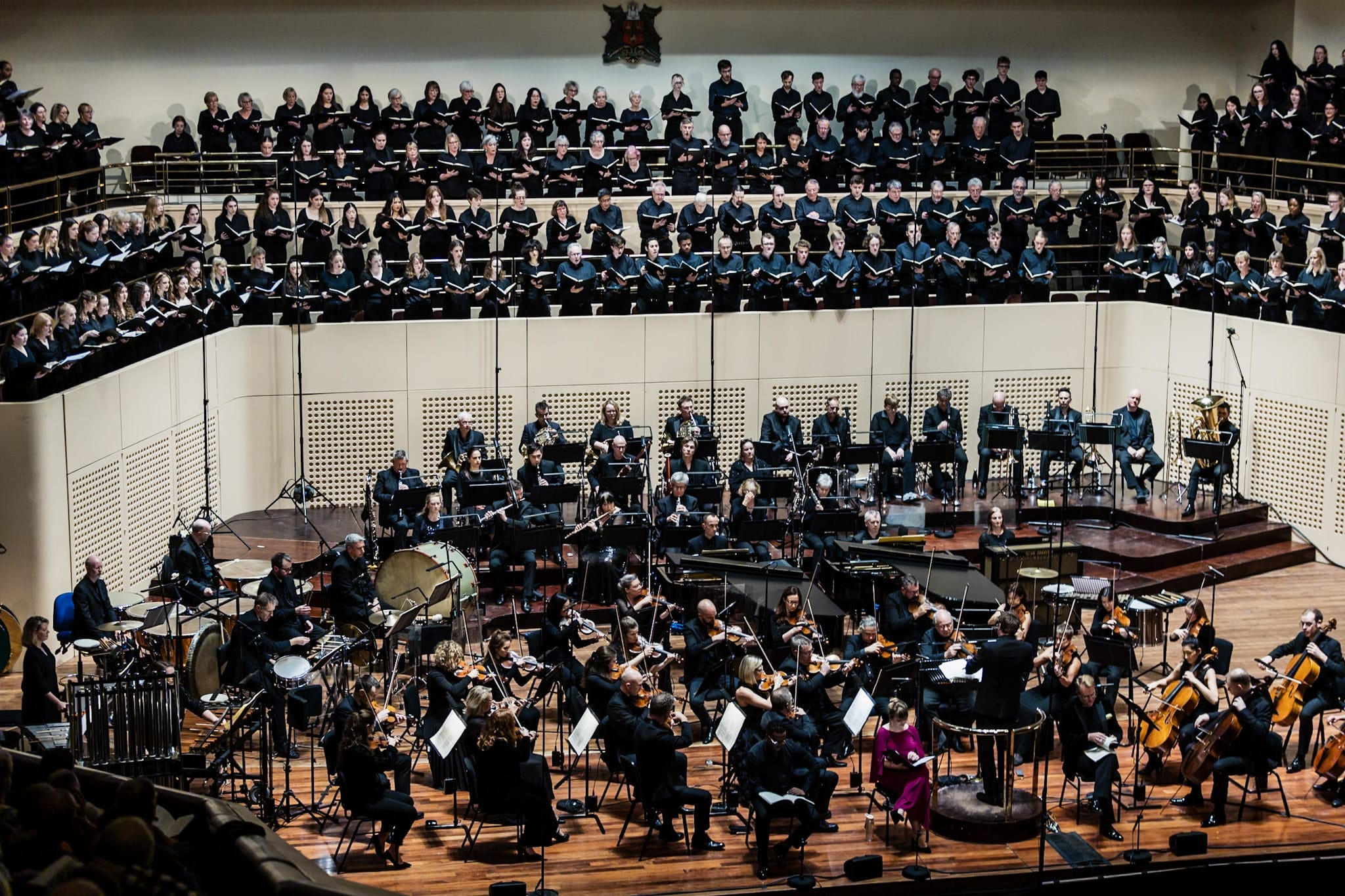 a wide shot of the stage at Theatre Royal & Royal Concert Hall Nottingham with a choir and orchestra performing