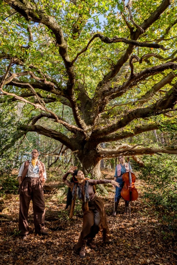 Frozen Light theatre company actors in front of oak tree