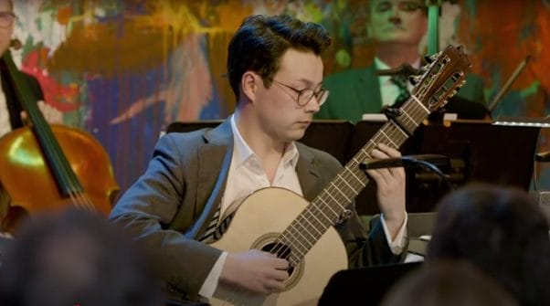 a photo of Sean Shibe performing on stage