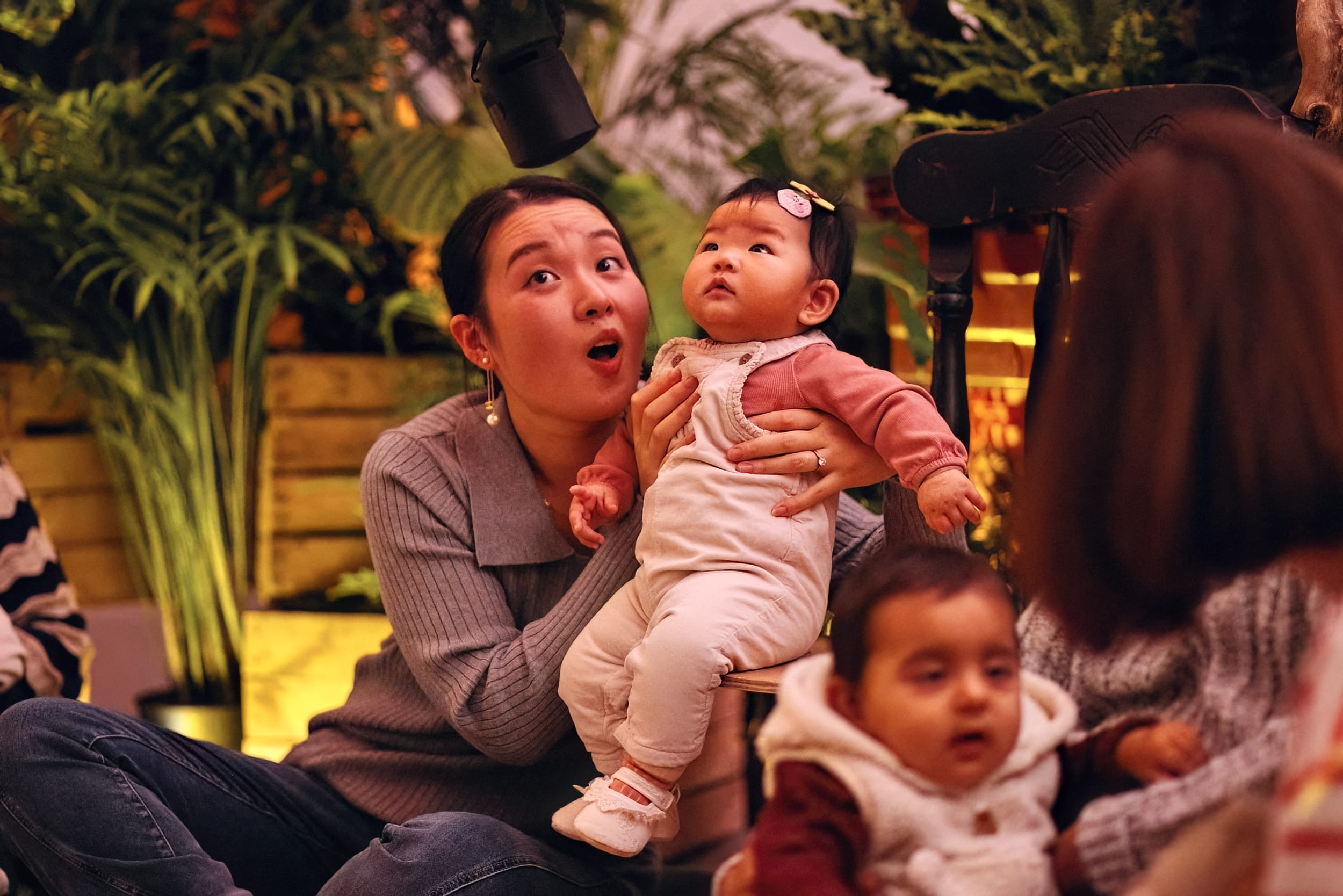 A family are amazed by a theatre production