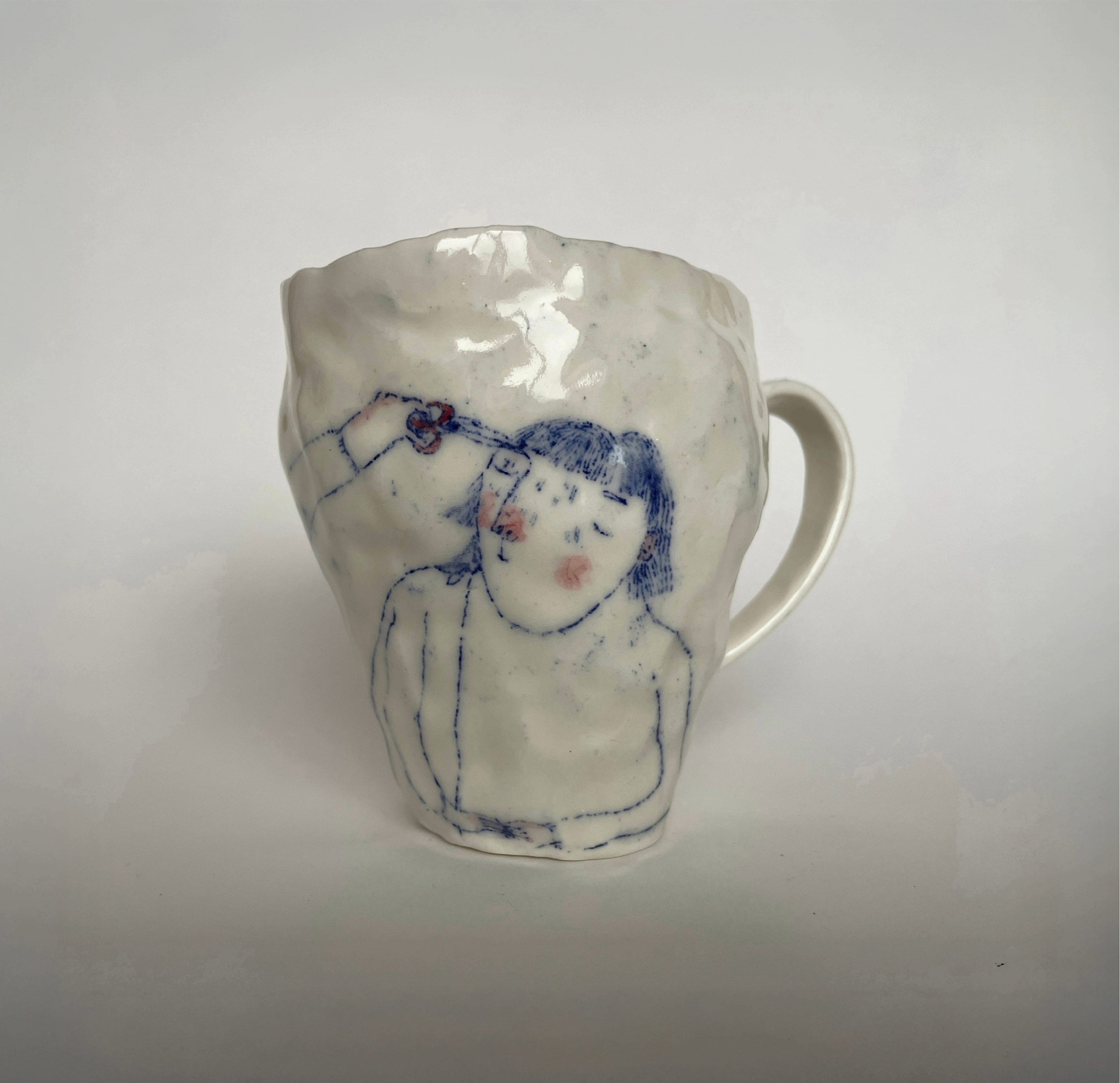 Textured, mug with a drawing of a woman on it.