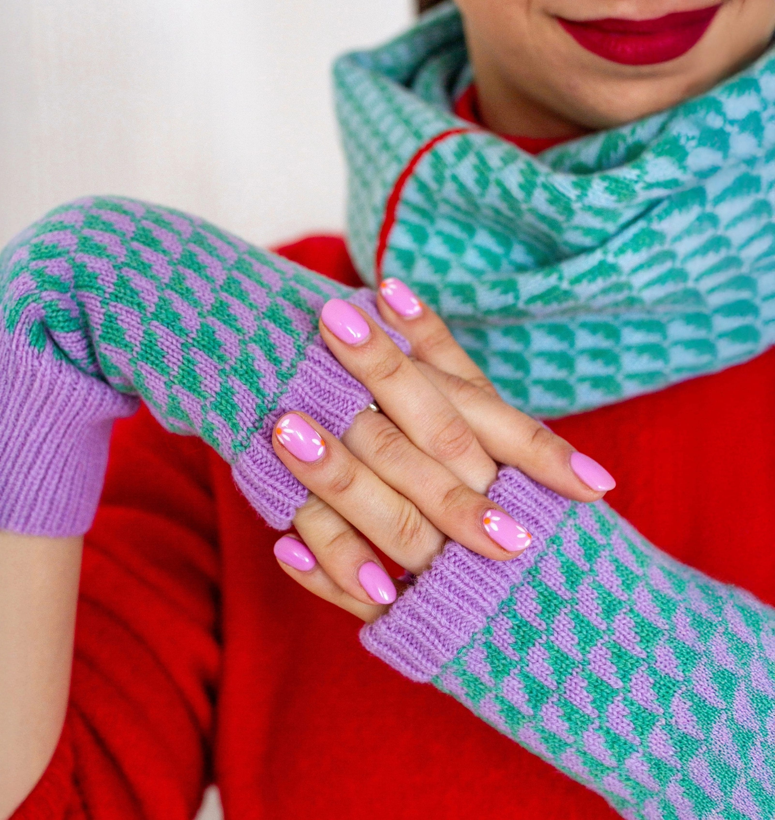 Wrist/ hand warmers and a scard with a beautiful pattern contrasting purple and teal and pale blue.