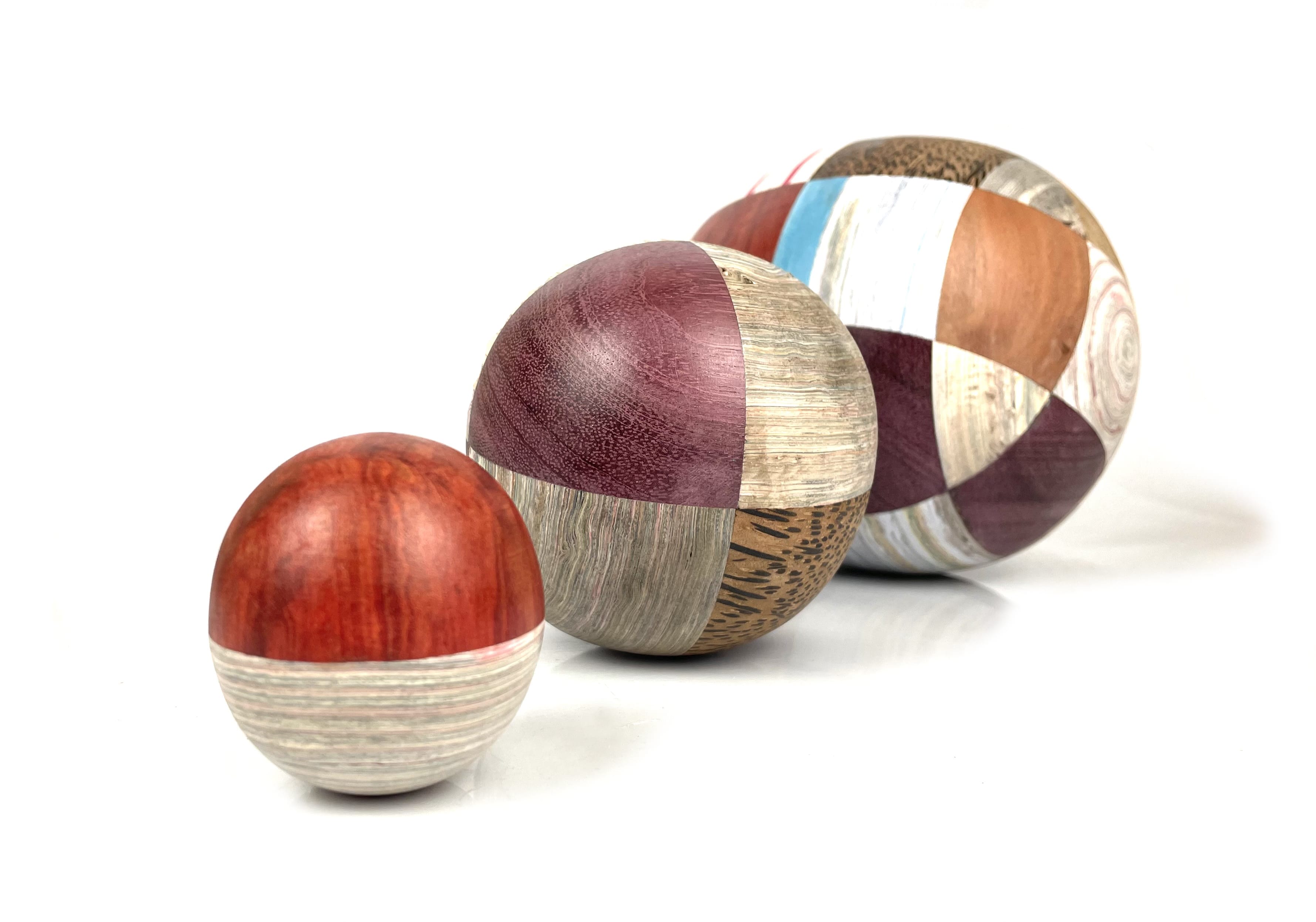 Wooden balls made from different types of and dyed wood, creating a geometrical desgin