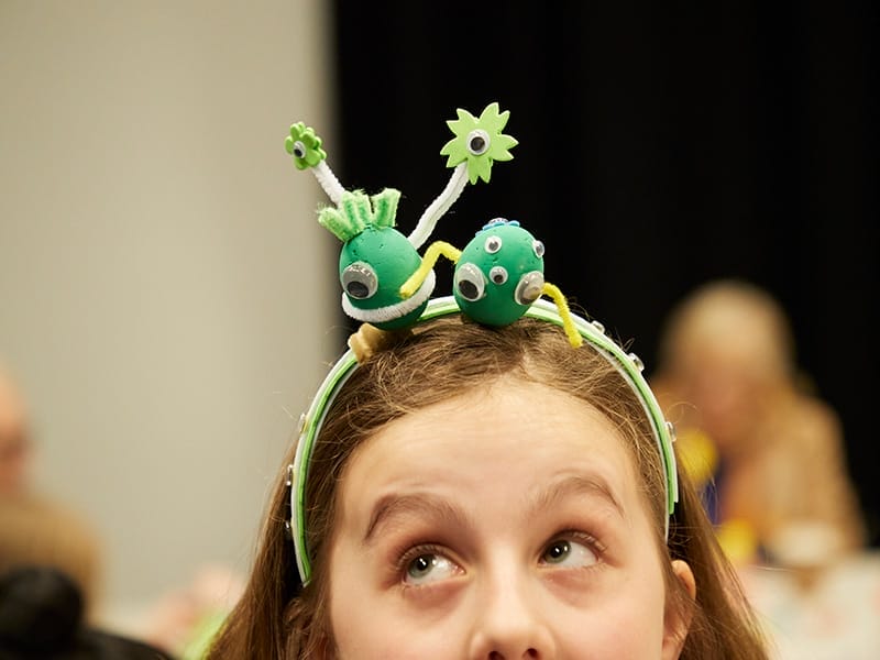 A girl wears a headband